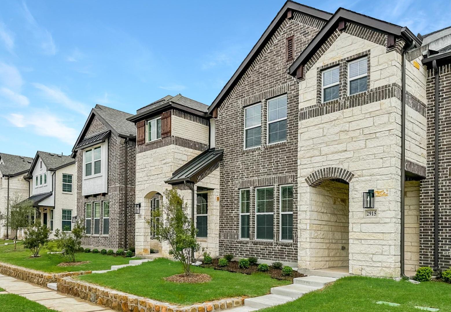 a row of townhomes in a neighborhood at The Villas at Bardin