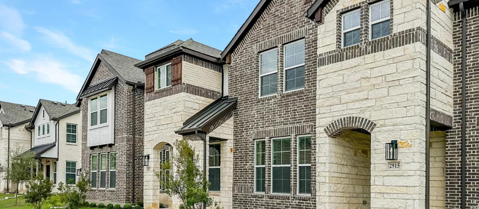 a row of townhomes in a neighborhood at The Villas at Bardin