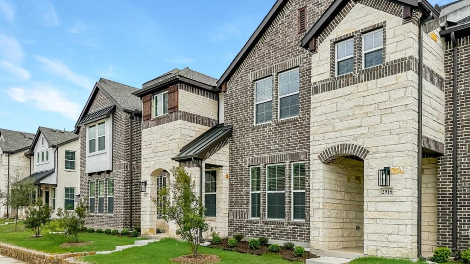 a row of townhomes in a neighborhood at The Villas at Bardin