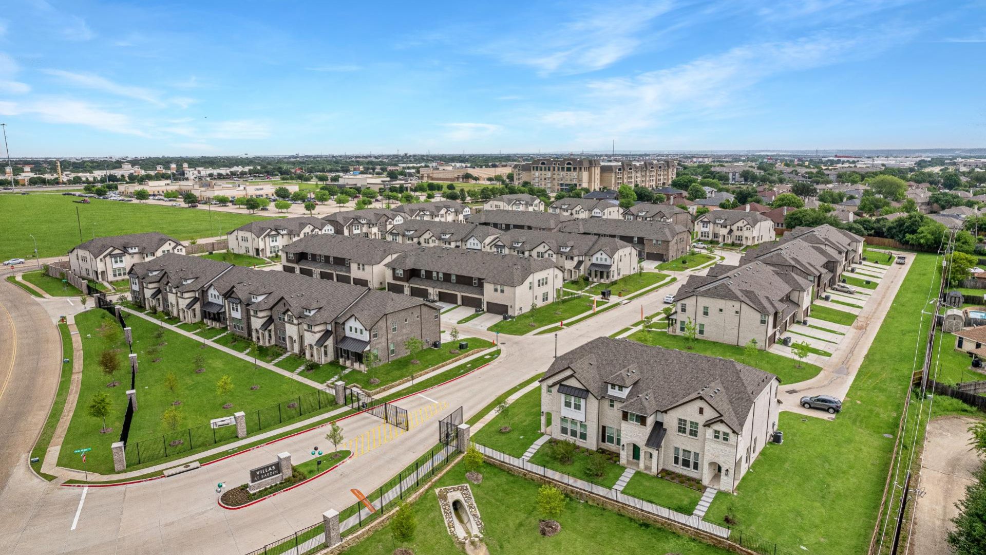 an aerial view of the townhomes in the city at The Villas at Bardin