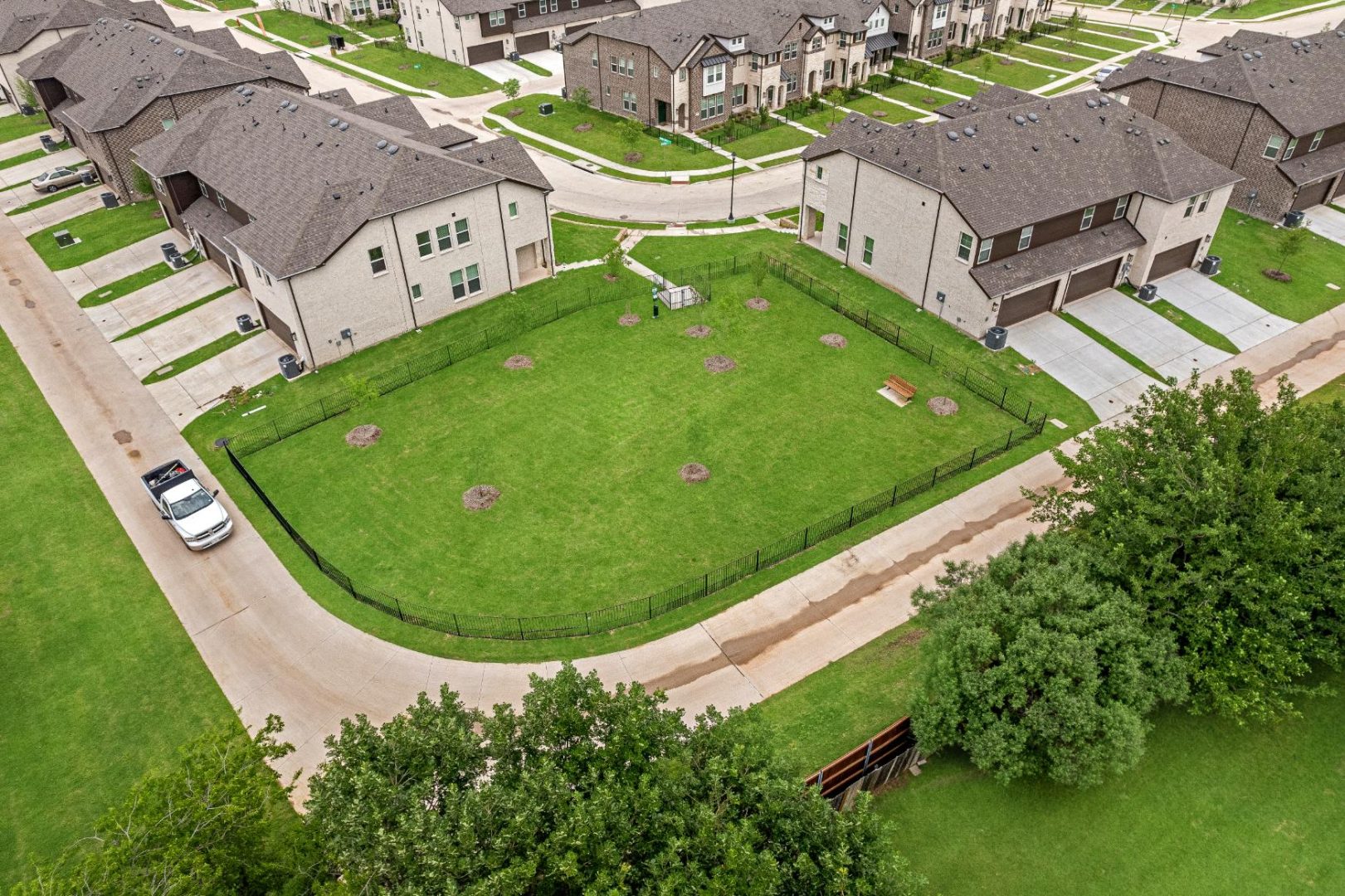 an aerial view of a residential neighborhood with a green lawn at The Villas at Bardin